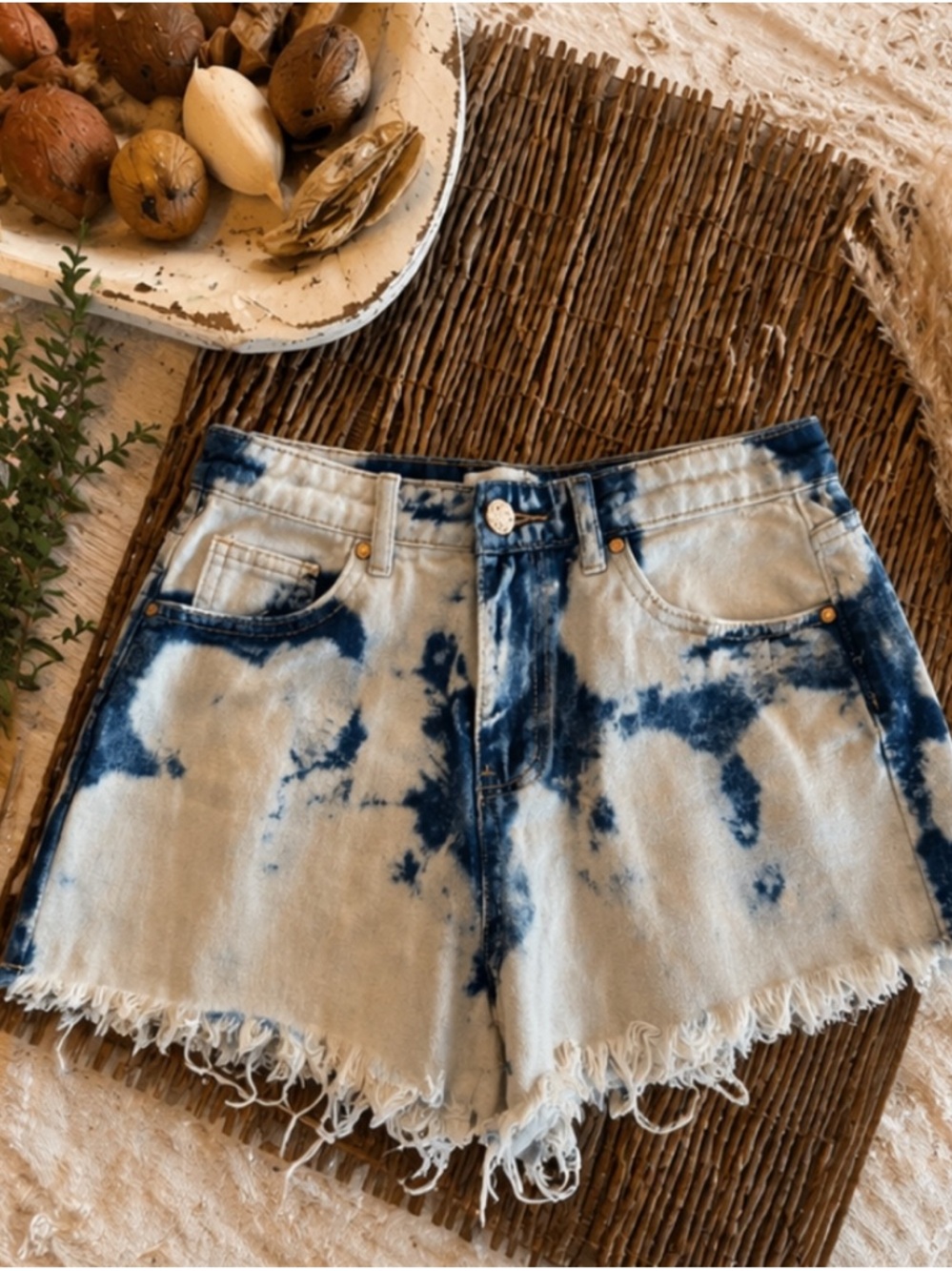 High-Rise Bleach Spattered Denim Shorts in Blue